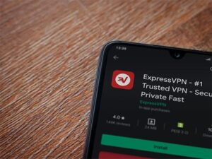An image featuring a phone that has opened the application ExpressVPN to download
