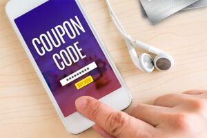 An image featuring a person using his phone and buying a coupon code concept